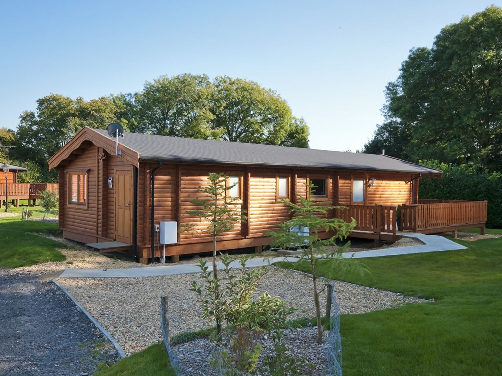 south winchester lodges with decking and hot tub