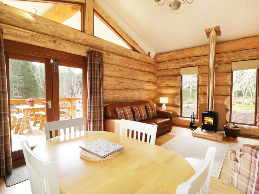 heron lodge and log cabin in cairgorns, lounge area with log burner
